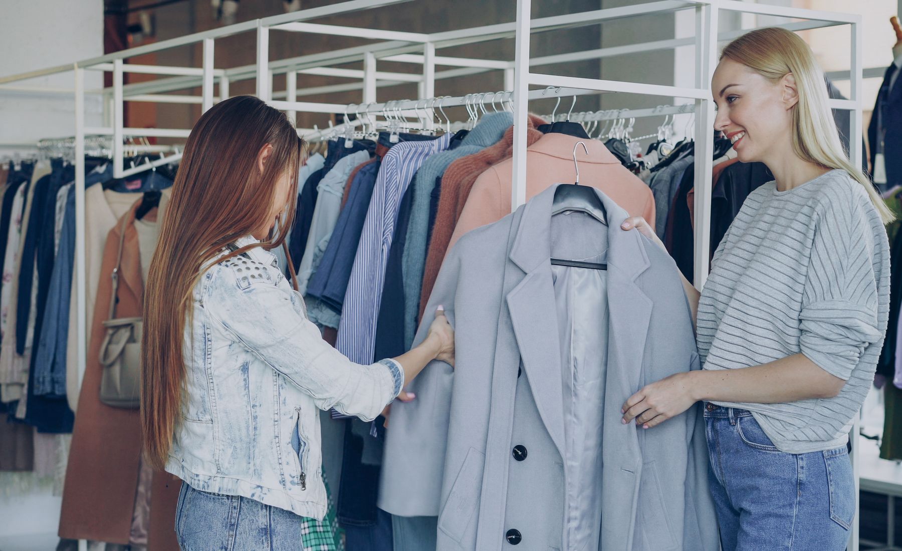 Customers choosing a jacket